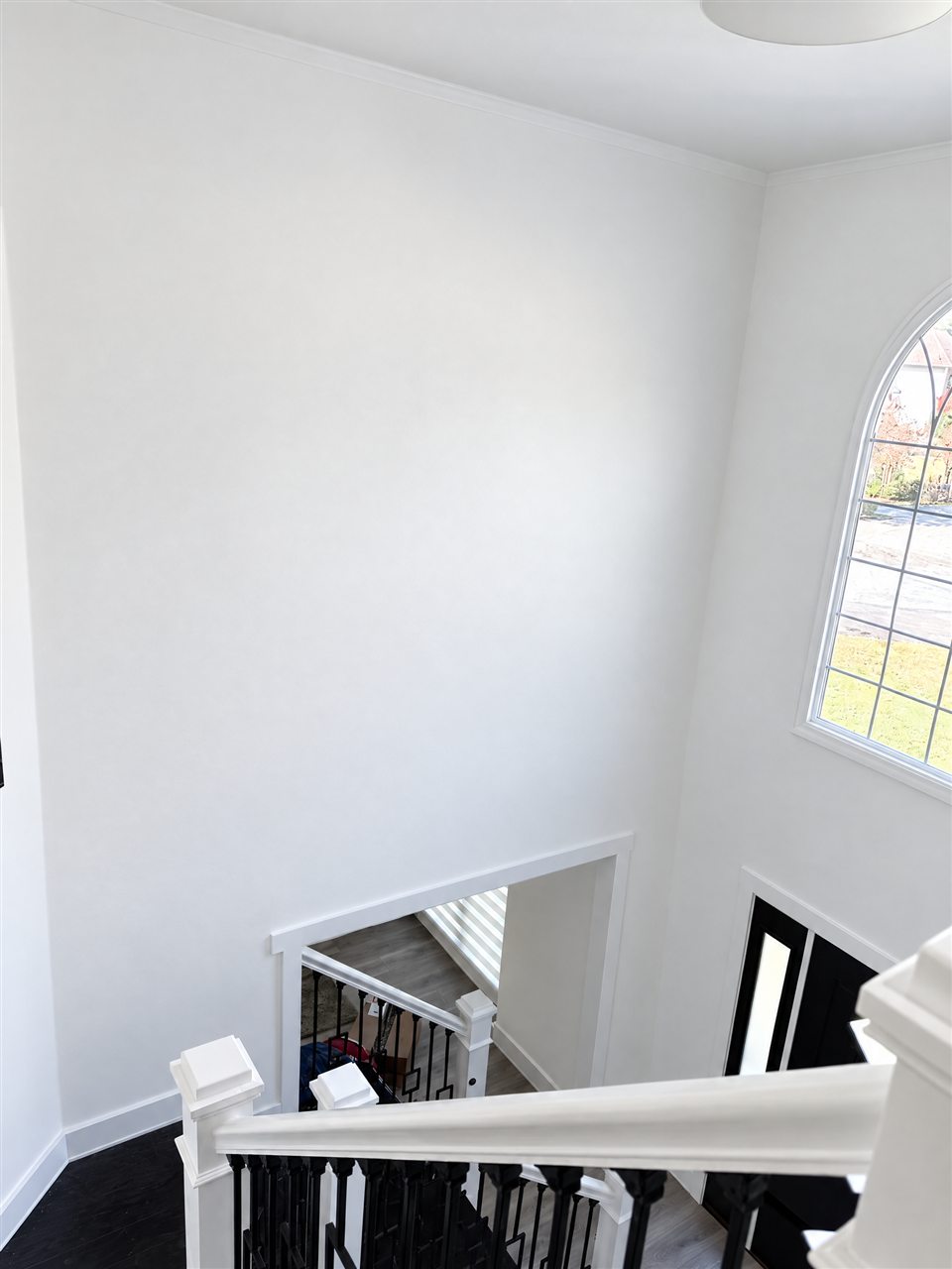 Same stairwell painted smooth white