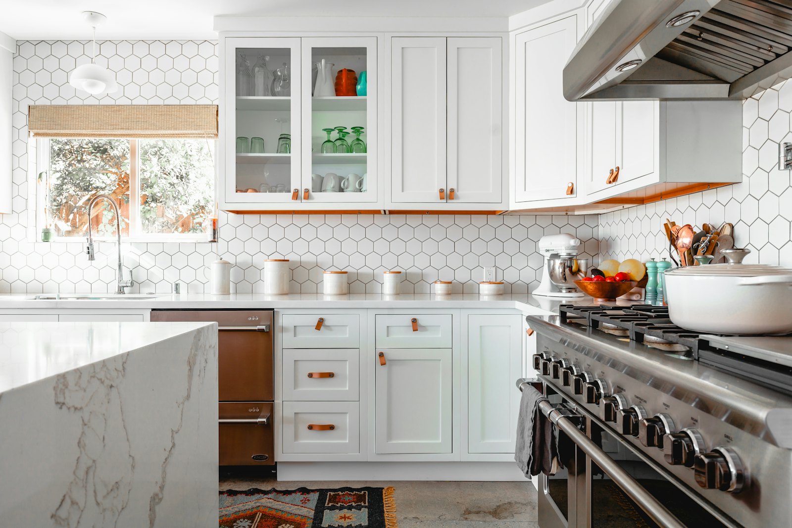 Kitchen with painted white cabinets